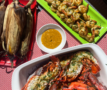 Grilled corn, grilled lobster, sazón butter, grilled shrimp, skewers, rooftop