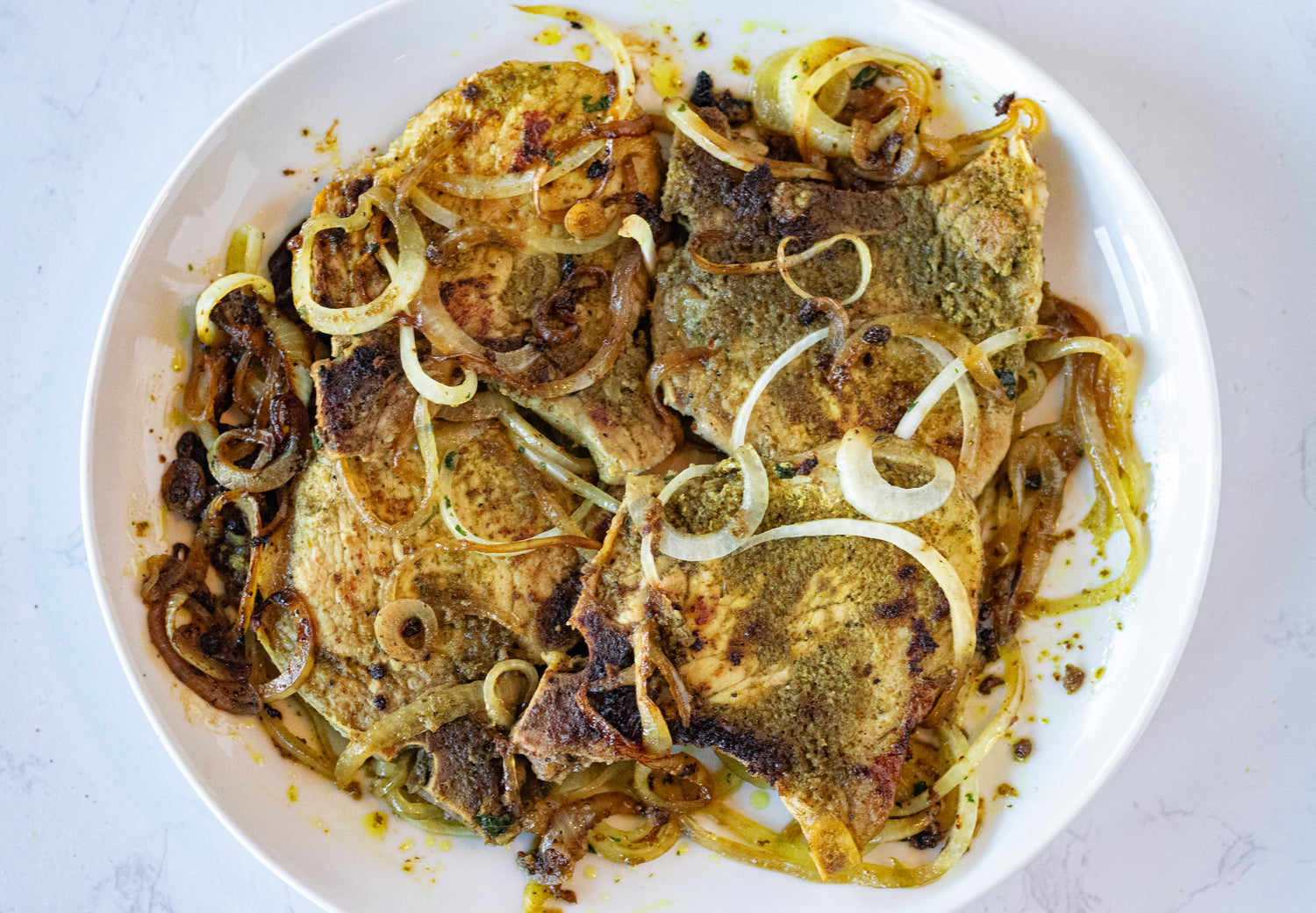 Chuletas Encebolladas