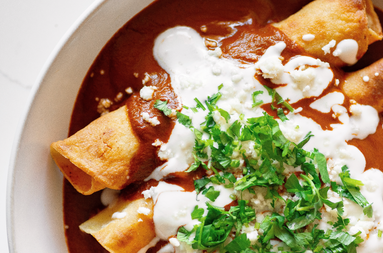 Pumpkin & Potato Taquitos in Mole Sauce